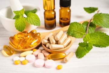 Alternative medicine herbal organic capsule with vitamin E omega 3 fish oil, mineral, drug with...
