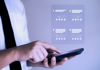 man taking online test via smartphone,online exam Choose the correct answer in the quiz.