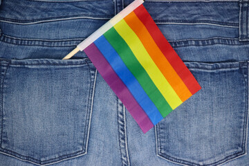 Pride flag in back pocket of jeans