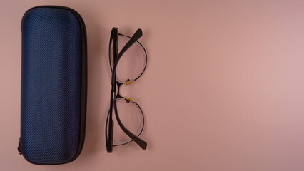 glasses, case for glasses lie on the table