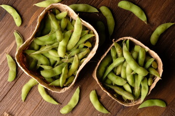 Edamame or mao dou in Chinese, has the Latin name Glycine mas is a tropical plant that belongs to the legume sub-family, which is a soybean variety that is harvested before it is ripe and tastes sweet