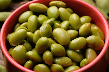 Closeup of peeled edamame. Edamame or mao dou in Chinese, has the Latin name Glycine mas is a tropical plant that belongs to the legume sub-family