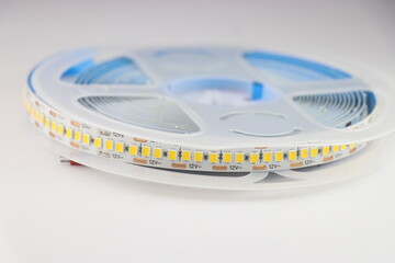 LED strip light in a reel ready for installation isolated on white background