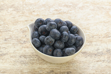 Sweet ripe blueberry heap in the bowl
