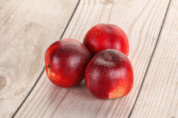 Ripe sweet juicy nectarines heap
