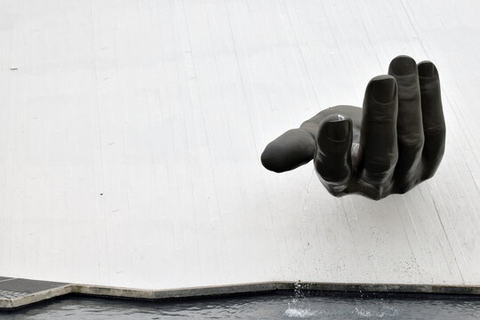Le Havre, France - Hand sculpture on Le Volcan, Le Havre&rsquo;s famous landmark, designed by Brazilian architect Oscar Niemeyer