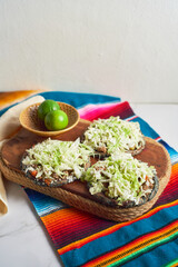 Sopes, with blue corn, traditional mexican street food.