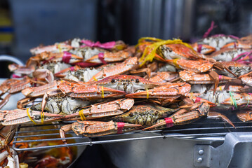 Many seafood crabs in vietnamese night market in food festival