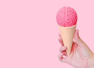 Human Brain Ice Cream in a Waffle Cone in Hand