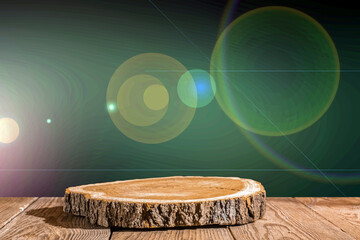  Slice wooden podium round saw cut of a tree on a green gradient background with lens flare effect....