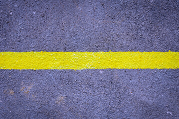 Naklejka premium Surface grunge rough of asphalt, Seamless tarmac dark grey with yellow line on the road.Texture Background.Asphalt Road Texture for Background.Top view