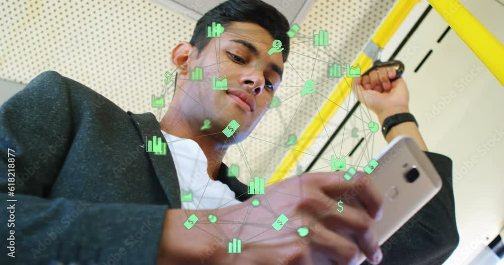 Poster animation of connected icons over low angle view of biracial man using cellphone on train