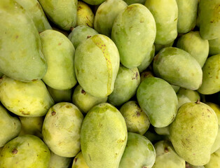 Pack of fresh ripe mangoes at market