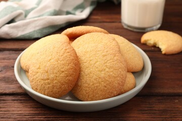 Delicious Danish butter cookies on wooden table, closeup