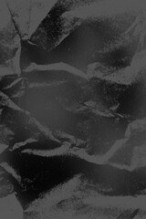 dark texture of a crumpled sheet