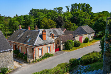 Fototapeta na wymiar Traditional houses in Yèvre le Châtel, a medieval village located in the French department of Loiret, Centre Val de Loire, France