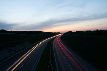 lights of cars driving at night. long exposure