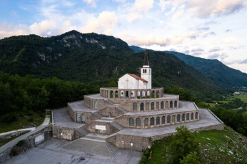 Drone view of St Anton Church and Kobarid Ossuary in Slovenia. Caporetto Memorial from First World War