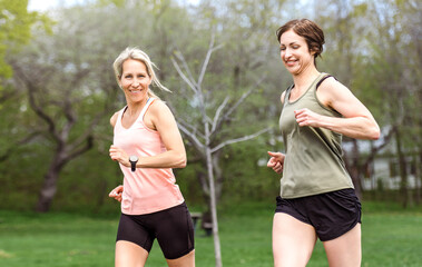 Two Females Runner Jogging Outdoor Workout together