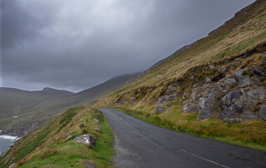 Westcoast Ireland. Road in misty and foggy landschape. Keel. 