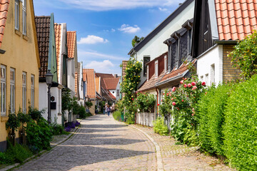 Fototapeta na wymiar Historic houses in Holm fisher village of the town Schleswig in Schleswig-Holstein, Germany