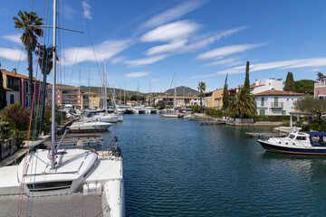 Port Grimaud marina in France in spring with yachts and sailing boats