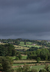 Fototapeta na wymiar Hills and dark clouds. Westcoast Ireland. Country side.