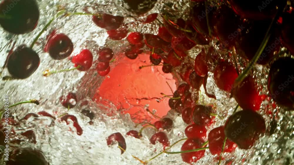 Aufkleber super slow motion of water wave with cherries. water surf wave rotating around and creating tunnel s