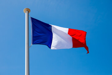 Blue sky and the National Flag of France