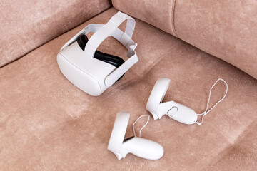 VR headset on the sofa. Domestic vr set at home