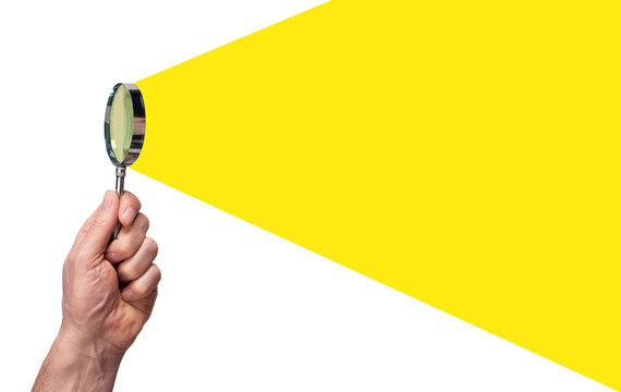Hand holding magnifying glass, searching, researching, looking for insight. Banner
