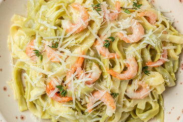 Pasta with prawns thyme and lime, fettuccine pasta. Italian food. recipe background. Close up