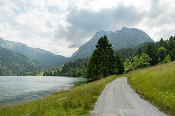 Naklejka na ściany i meble Lake Waegitalersee in an alpine scenery in Switzerland