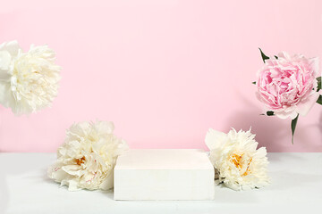 Abstract background with natural wooden podium and peonies flowers, minimal floral composition, empty showcase for beauty products showcase or presentation, selective focus,romance style