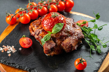 Juicy steak medium rare beef with tomatoes, Restaurant menu, dieting, cookbook recipe top view