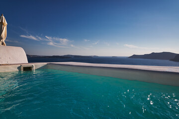 Swimming Pool in Oia Village - Caldera View in Santorini Island, Greece