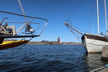 Boats with Stockholms waterfront in the background