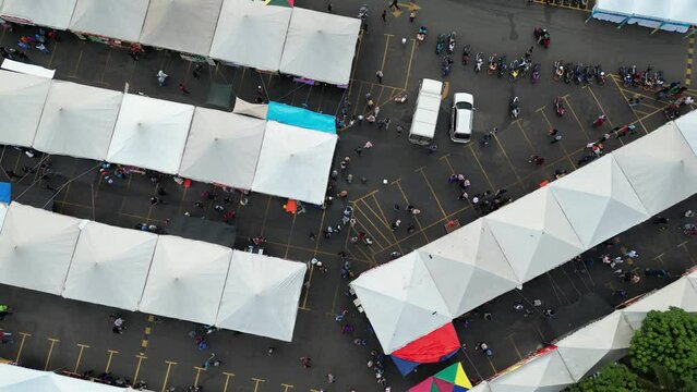 Aerial look down people go ramadhan bazaar during Puasa at Bukit Meryajam, Malaysia