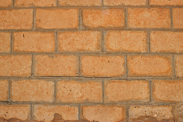 Weathered stained old brick wall background