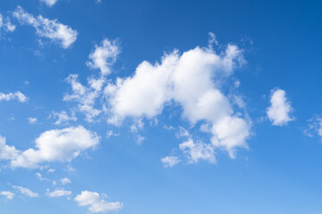 Naklejka na ściany i meble Blue sky with white clouds in spring