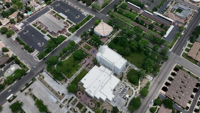 Aerial St George Utah LDS Temple circle full 3. Southwestern desert. Pioneer temple in residential area built in 1877. First LDS temple in Utah. The Church of Jesus Christ of Latter-day Saints.