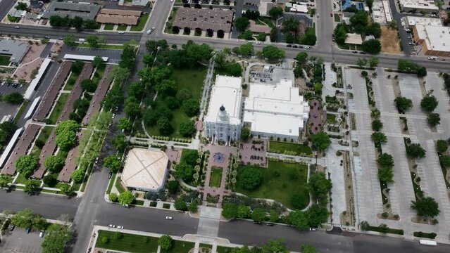 Aerial St George Utah LDS Temple circle full 1. Southwestern desert. Pioneer temple in residential area built in 1877. First LDS temple in Utah. The Church of Jesus Christ of Latter-day Saints.