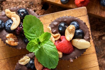 Delectable Close-Up of Homemade Chocolate Fruit and Nut Cups, Crafted with Love in Stunning 4K Resolution