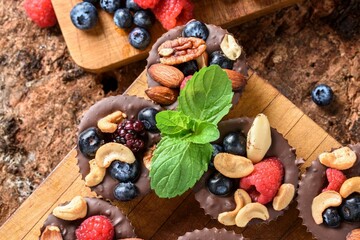 Delectable Close-Up of Homemade Chocolate Fruit and Nut Cups, Crafted with Love in Stunning 4K Resolution