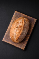 Delicious fresh baked crispy loaf of bread with seeds and grains