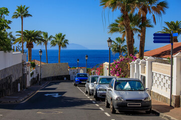 Cars parked at the streets of Puerto de Santiago, Tenerife, Spain