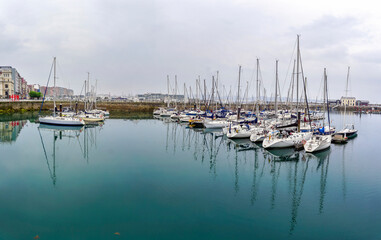 Marina with moored sailboats