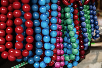 Wooden red beads on the market