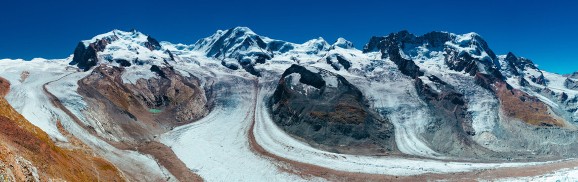 High Alps mountains with glacier panoramic view