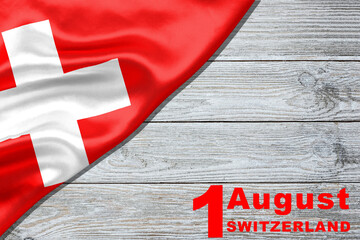 Swiss National Day greeting card. Date August 1 and text in English on a wooden table: 1. August Switzerland. Vector banner with the flag of Switzerland. - obrazy, fototapety, plakaty